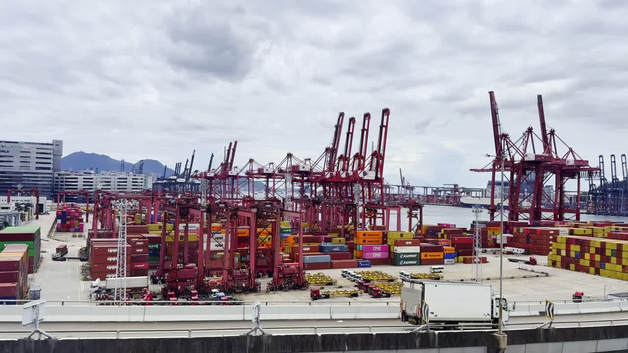 Footage of Hong Kong’s busy ship port with vessels, cargo activity, and harbor operations, showcasing maritime trade, transportation, and the vibrant connection between the sea and the urban skyline