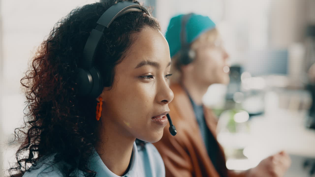 Call center workers with headsets