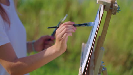 woman painting outdoors