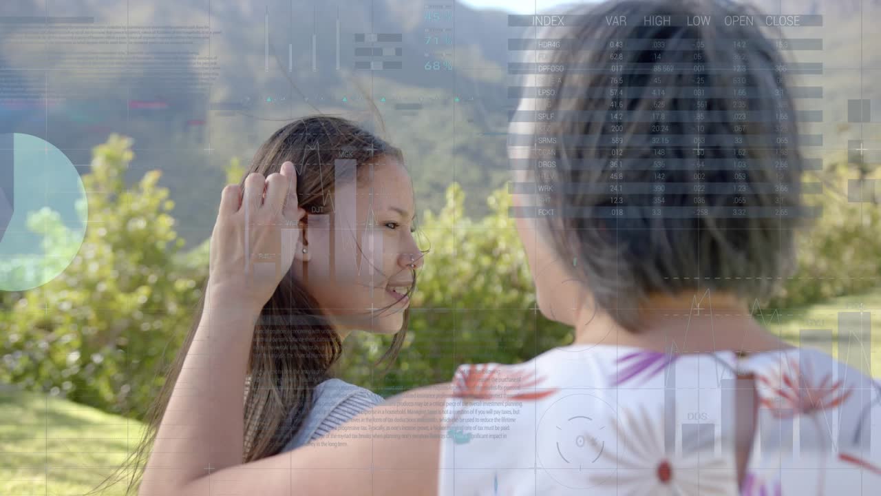 Older woman reaching up and fixing teen girl hair, caring while health data charts overlaying heads