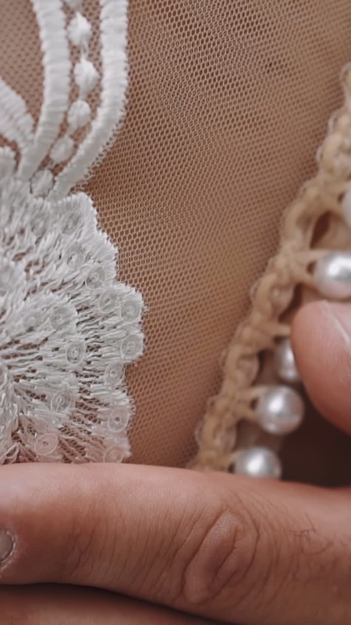 Groom hugs woman wearing elegant lacy dress at wedding ceremony extreme closeup slow motion. Newlywed loving man and woman together. New family