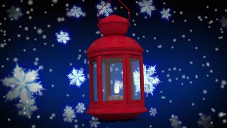 animation of snow falling over red lantern on navy background