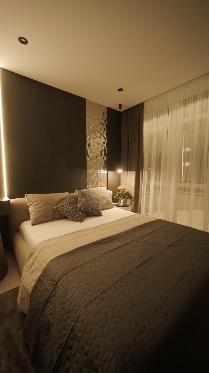 Stylish and elegant minimalist home interior featuring clean lines, neutral colors, and warm ambient lighting, creating a cozy and modern atmosphere.