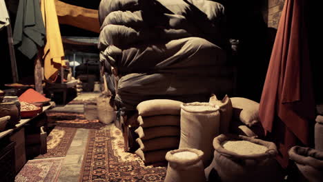 old national african bazaar filled with colorful textiles and sack goods