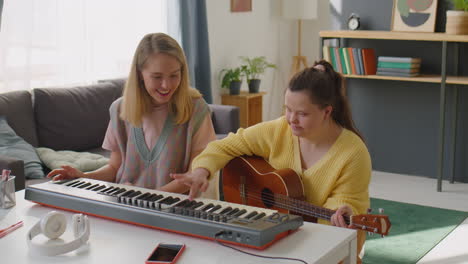 girl with down syndrome learning musical instrument with teacher