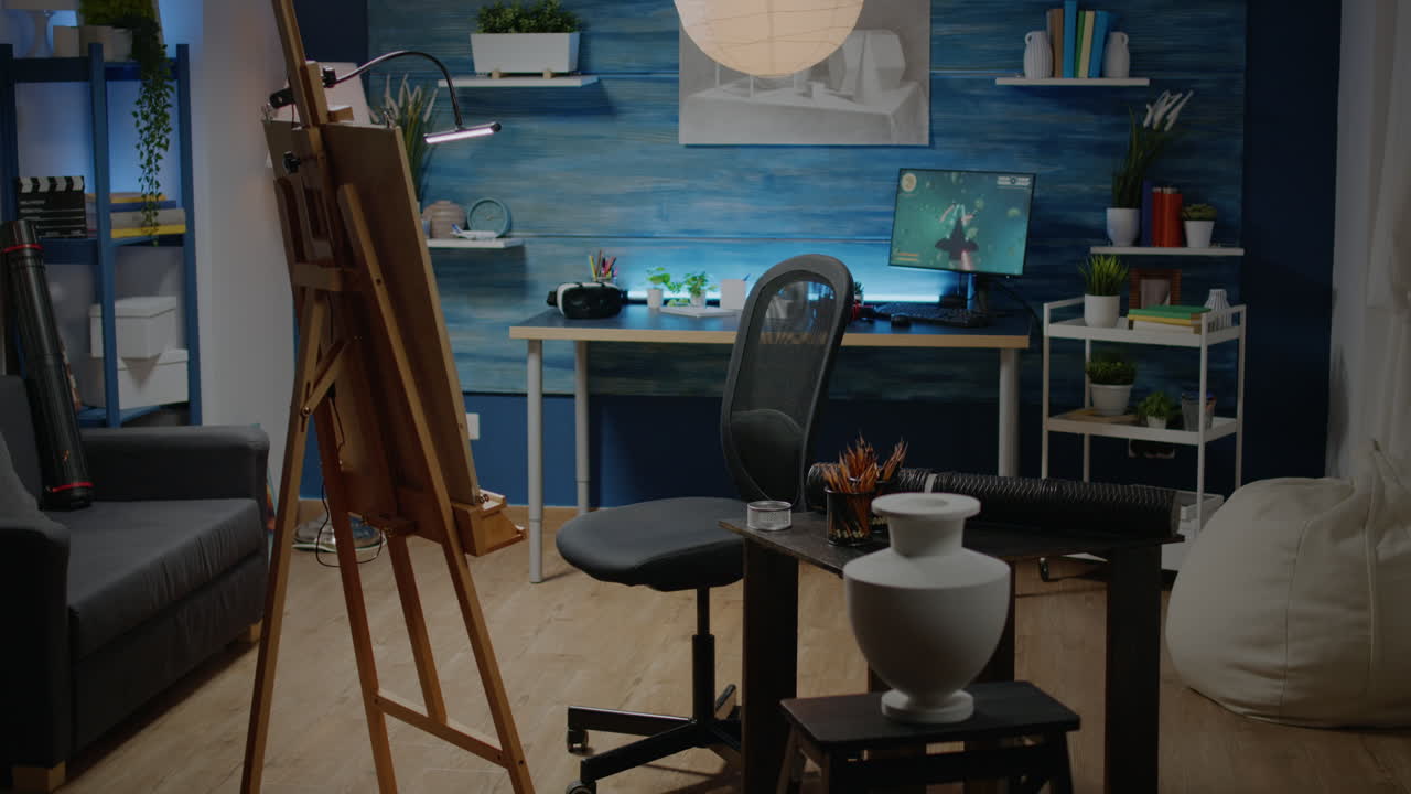 Empty creativity studio space with white canvas and easel