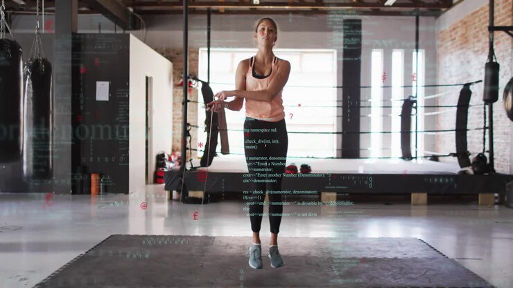 Fitness enthusiast stretching in gym with digital data overlay animation