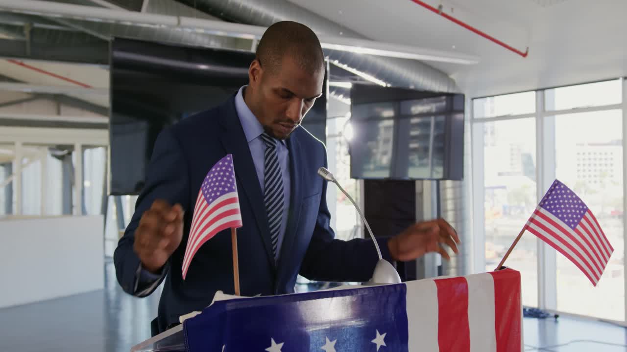 Male speaker addressing audience at political convention