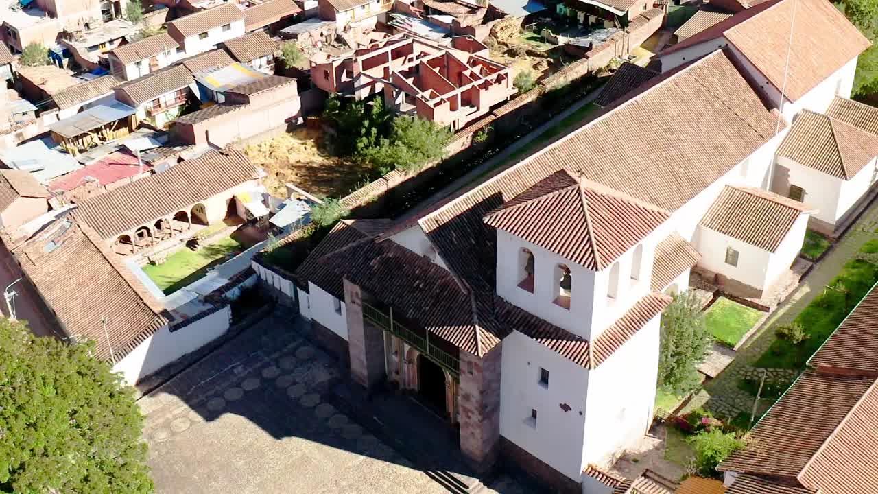 San Pedro Apóstol de Andahuaylillas church in Cusco, Peru, with surrounding buildings