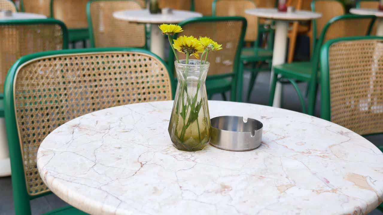 Table with flowers and chairs