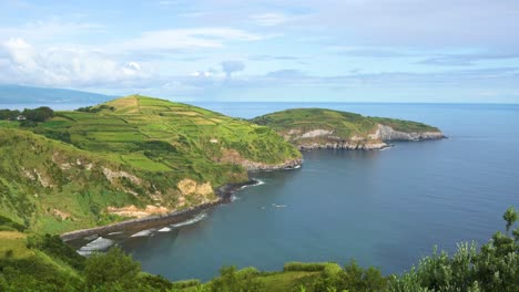 view of the coastline and port of santa iria from the miradouro de santa iria lookout in san miguel island, the azores, portugal