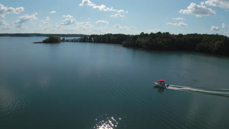 FPV-Drone-Boat-Chase-with-Orbit-on-Georgia-Lake-on-Bright-Sunny-Day