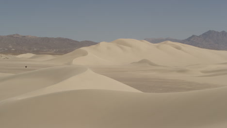 pan across dumont dunes, large and imposing, arid and hot