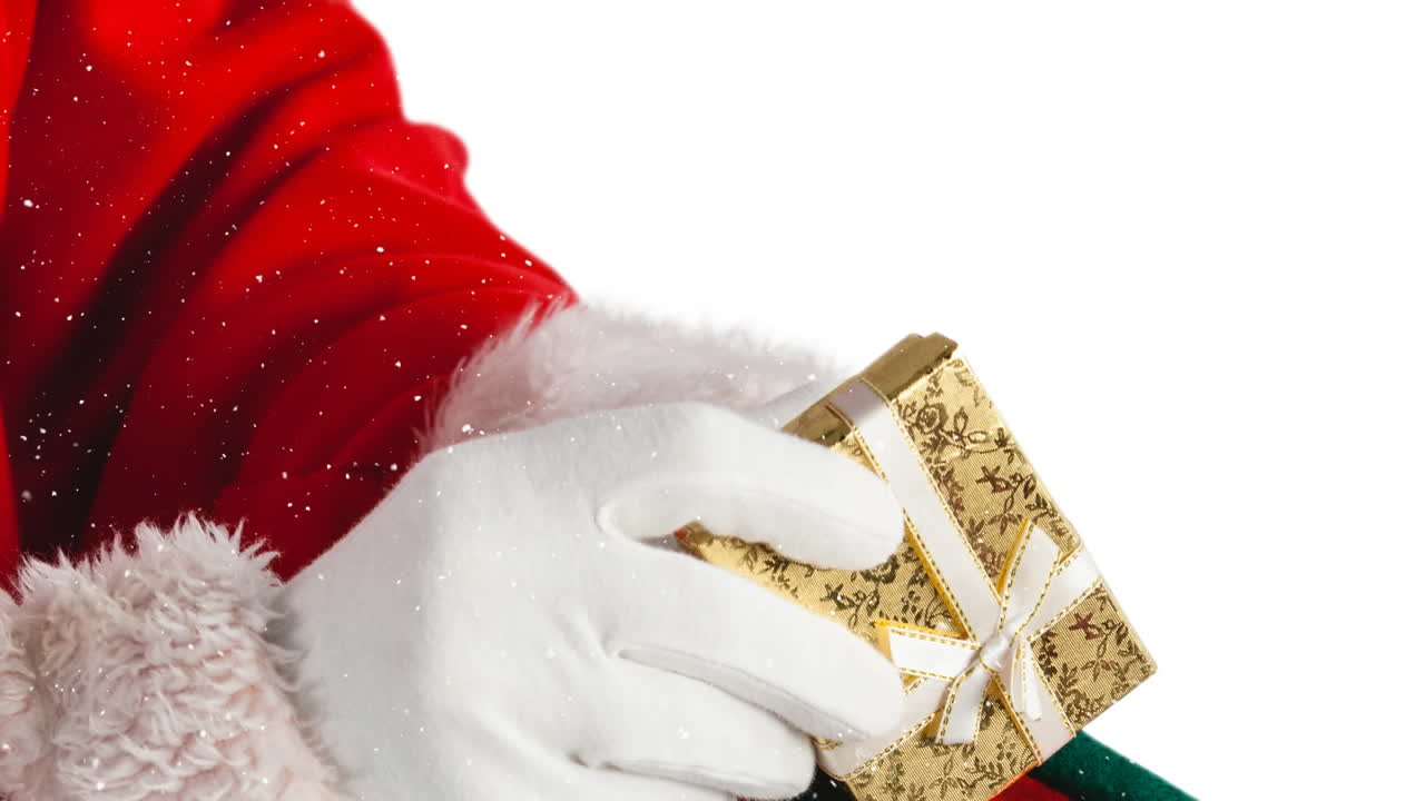 산타클로스가 선물을 들고 있는 눈이 떨어지는 애니메이션