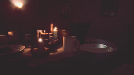 table setting in candlelight at night