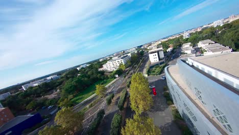 fpv drone shot following a classic car in the streets of montpellier