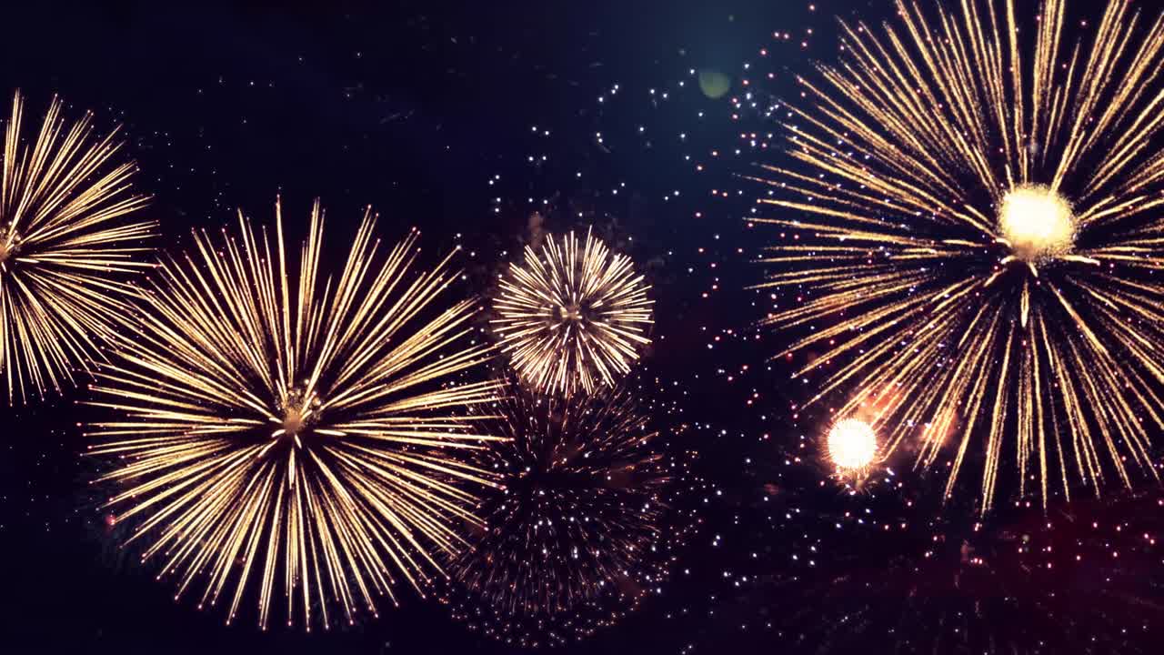 Shining fireworks display explosion with bokeh lights in night sky loop animation background
