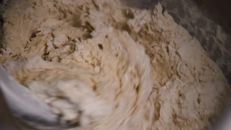 mixing dough in a kitchen mixer