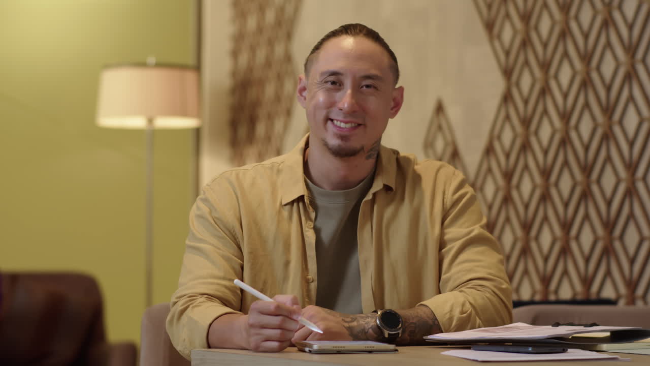 Portrait of Entrepreneur Working on Digital Tablet