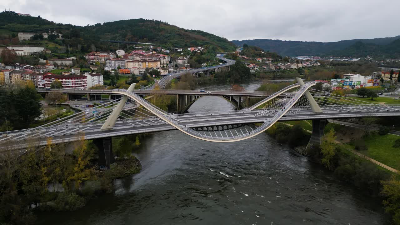 High angle overview of Millennium Bridge Mi&ntilde;o River in Ourense, Galicia, Spain