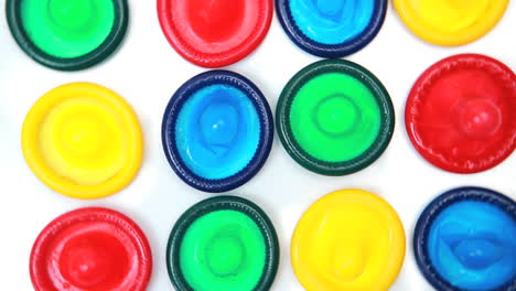 many brightly coloured condoms