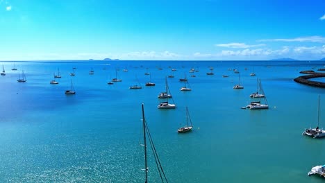 boats anchored in the sheltered waters of airlie beach outside the breakwater