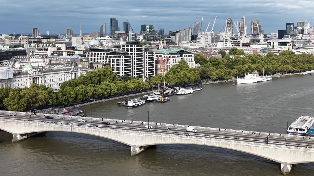 London buses crossing Waterloo bridge London UK ,aerial 4K footage
