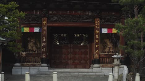 wooden door at the entrance of chuo temple in sapporo, japan