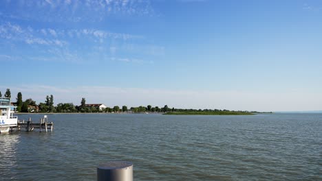 Peaceful-scene-of-Lake-Neusiedler-See-in-Podersdorf,-Austria,-static-wide-shot