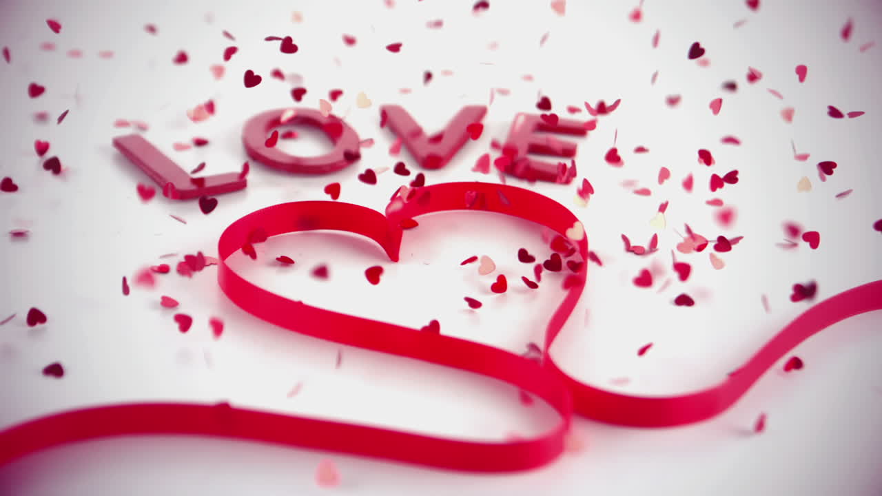 testo d'amore e nastro rosa a cuore con confetti