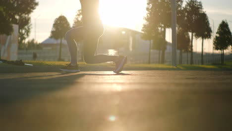 woman running outdoors at sunset