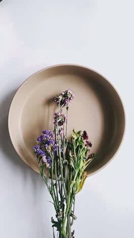 dried flowers in a bowl