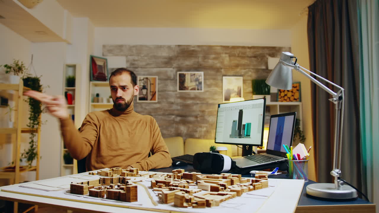 Successful architect using augmented reality holograms