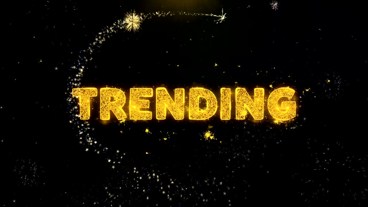 금 입자 불꽃놀이 디스플레이의 트렌드 텍스트.