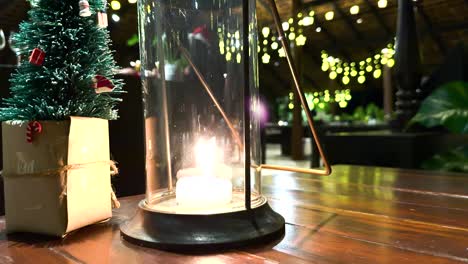 candle and decorations on a wooden table