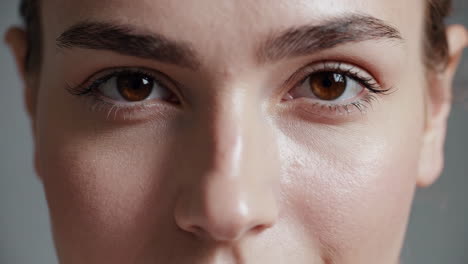 close-up details of a woman's face and eyes