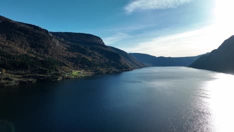 Beautiful-Sorfjorden-sea-from-Trengereid-to-Arna,-Osteroy-island-on-right-frame,-aerial