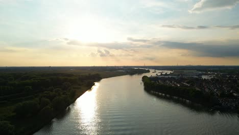 Cargo-ship-with-coal-bulk-load-on-the-Binnen-Merwede-river-in-Sliedrecht,-Netherlands