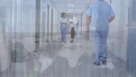 animation of world map over diverse doctors walking on hospital corridor