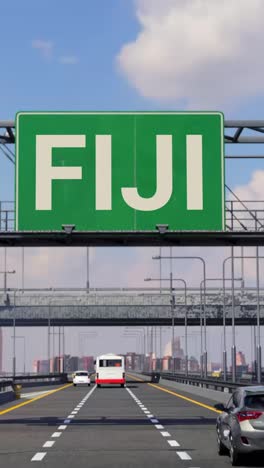 fiji highway sign with airplane in the sky