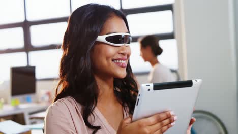 woman using virtual reality glasses and digital tablet