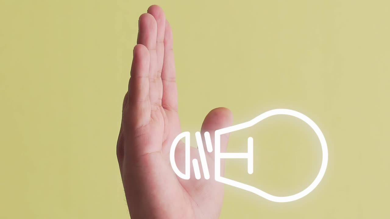 Light bulb symbol or idea animation appearing on a hand