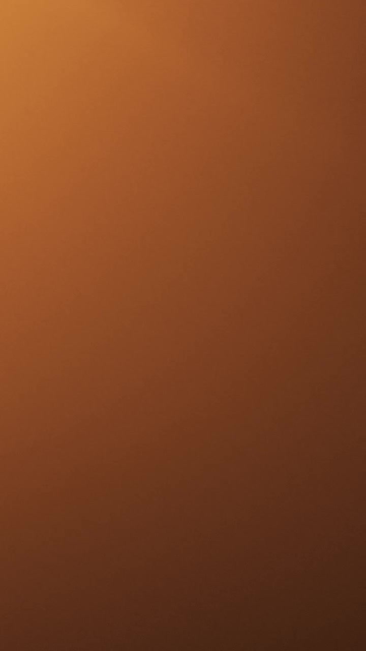 Transizione di Luce Astratta con Bagliore Arancione Caldo