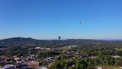 hot air balloons flying over the city of cumming georgia