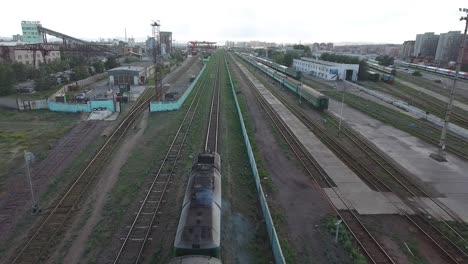 Aerial-drone-station-close-up-following-train-in-Mongolia-Ulan-Bator