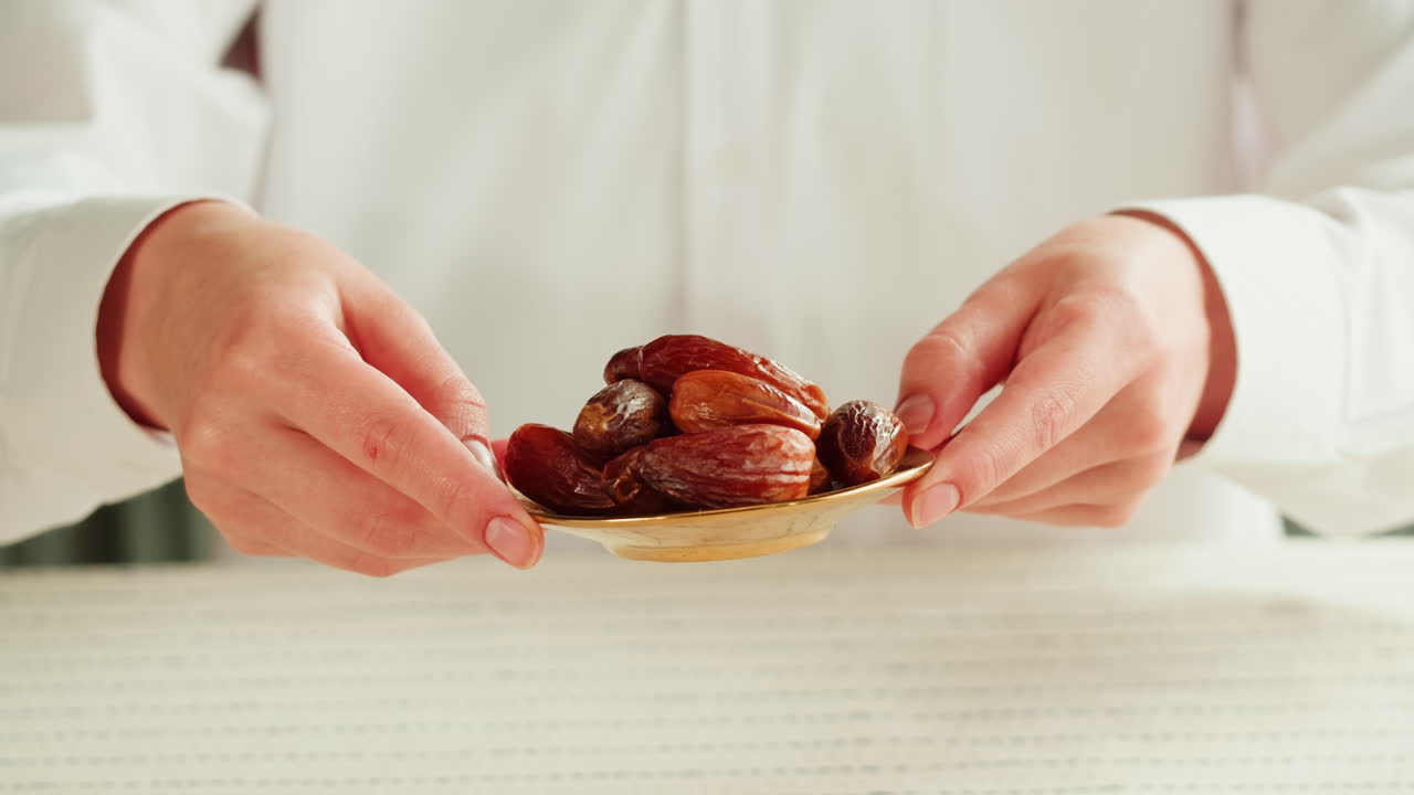 Dates in a small gold plate