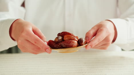 dates in a small gold plate