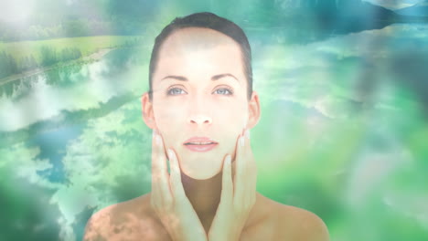 woman touching face over animation of clouds and green landscape