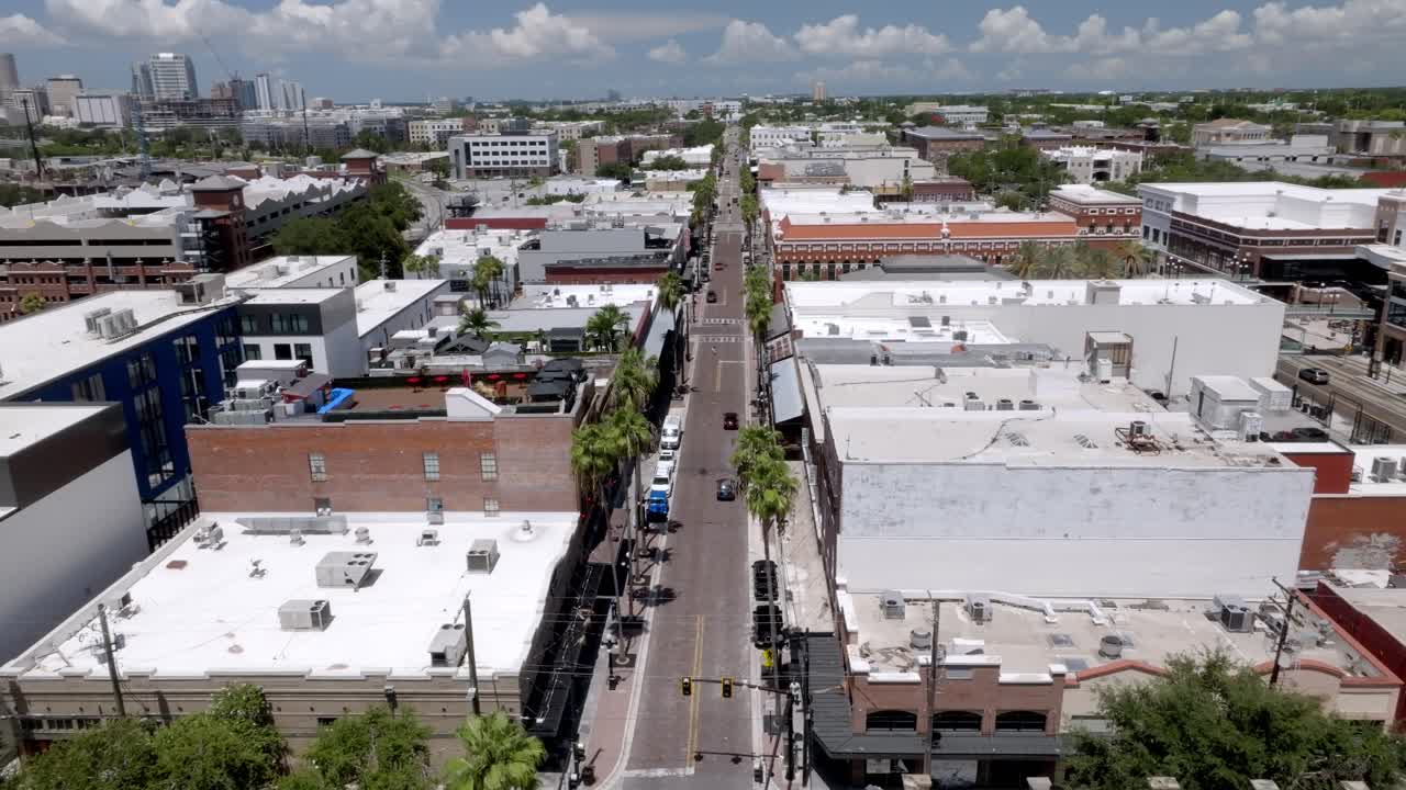 Ybor City neighborhood in Tampa, Florida with drone video moving in circle wide shot
