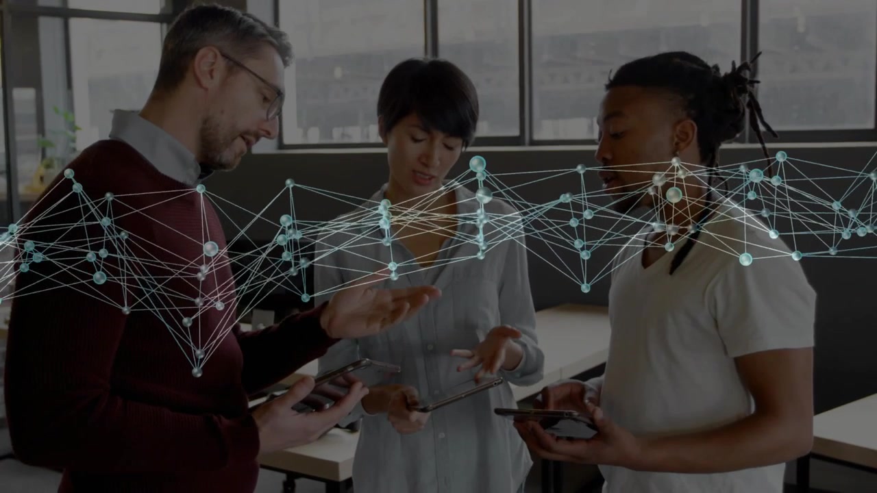 Diverse Business Team Collaborating with Digital Devices and Network Overlay